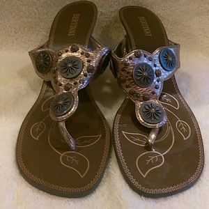 Brown and gold sandals